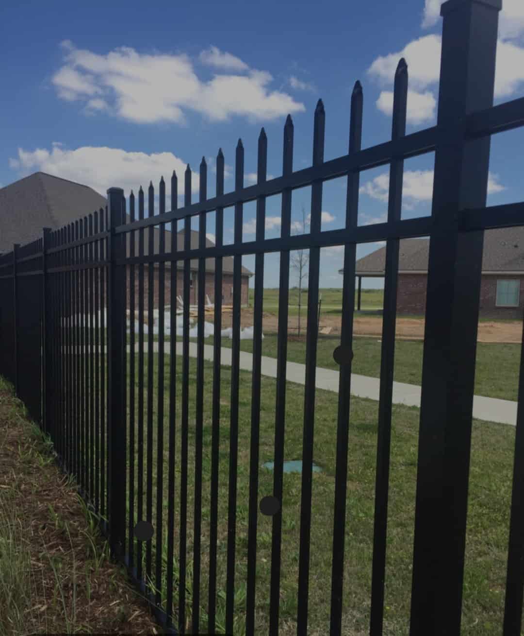 Aluminum pool fence installation by Basin Fence Company