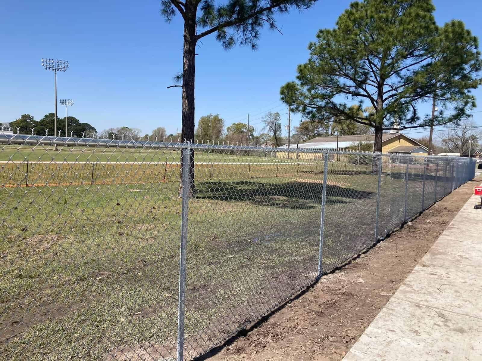 New chain link fence installed by chain link fence contractors in New Iberia Louisiana