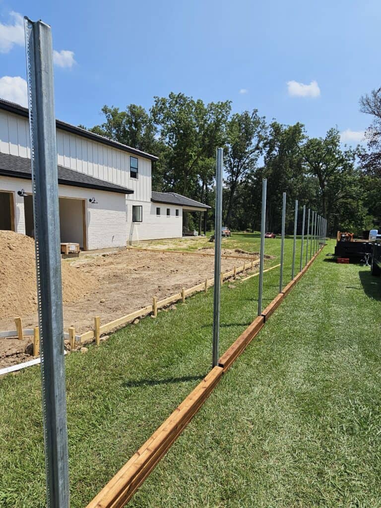 Postmaster steel posts installed by Basin Fence in Lafayette Louisiana